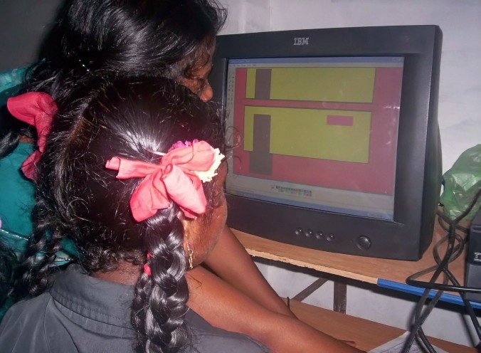 File:Students working with computer.jpg